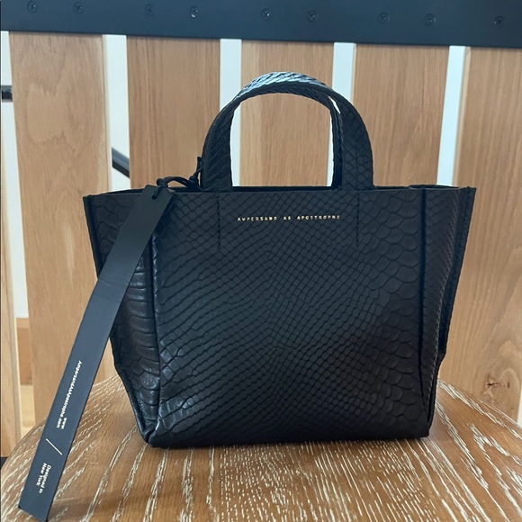 Ampersand as Apostrophe Accessories - “Ampersand as Apostrophe”

New Black Python Micro Tote
- Cross body,